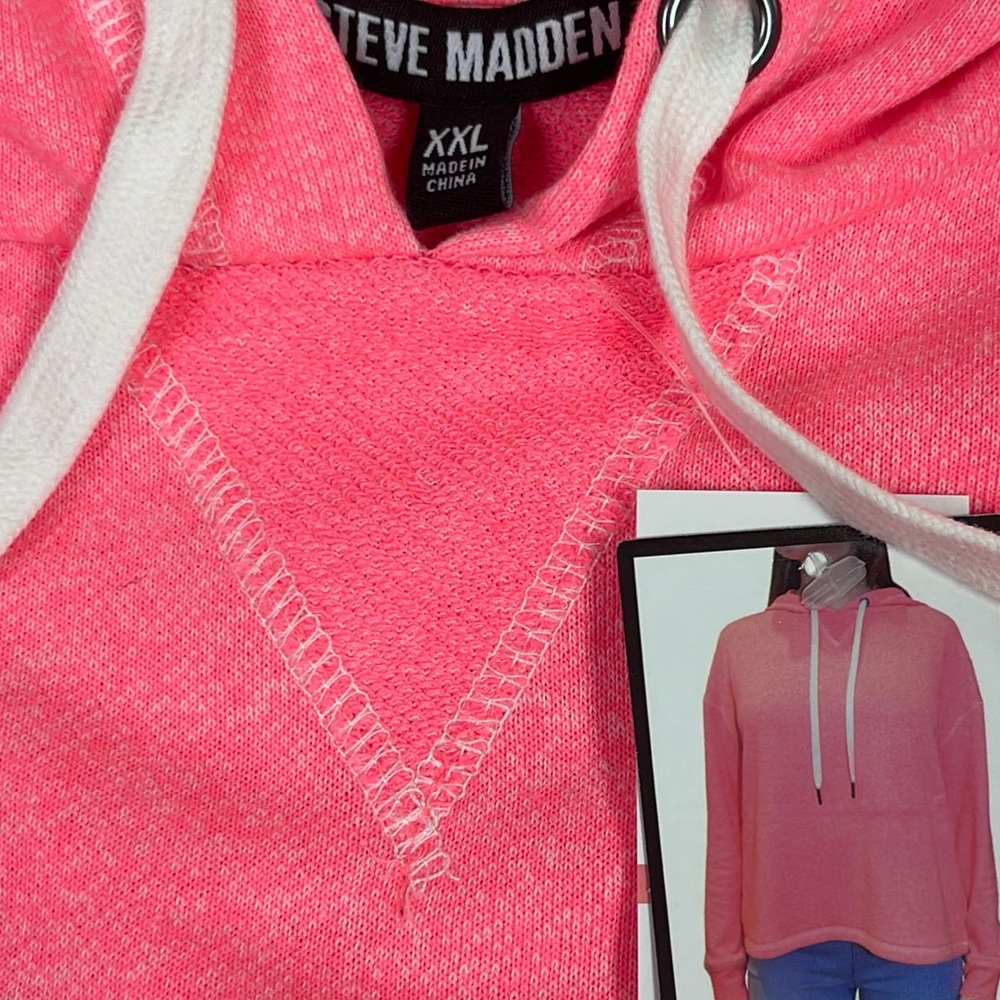Brand new with tags Woman’s Steve Madden hooded sweatshirt. Size XXL.
